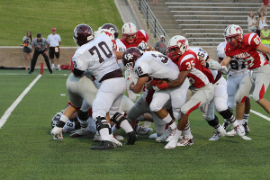 Varsity football outlasts Memorial in double OT