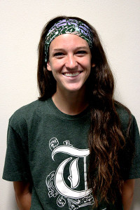 Behind Kelly Thomson’s Smile