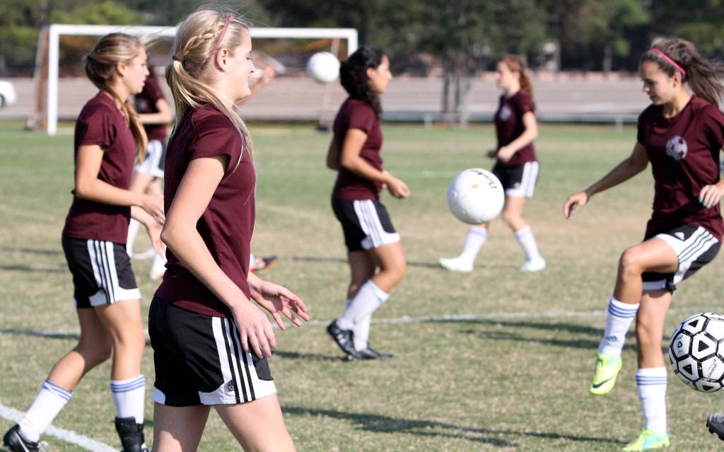 Varsity girls soccer practicing for the first game of the season against Lamar Jan. 13, 2012