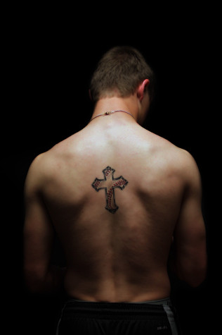 Trent Bowles and his baseball cross tattoo. 
