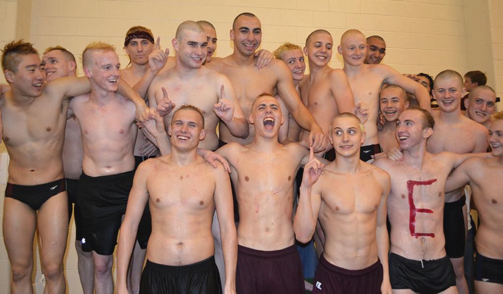 After+two+days+of+fast+swimming%2C+the+boys+stand+up+on+the+podium+and+celebrate+their+success.
