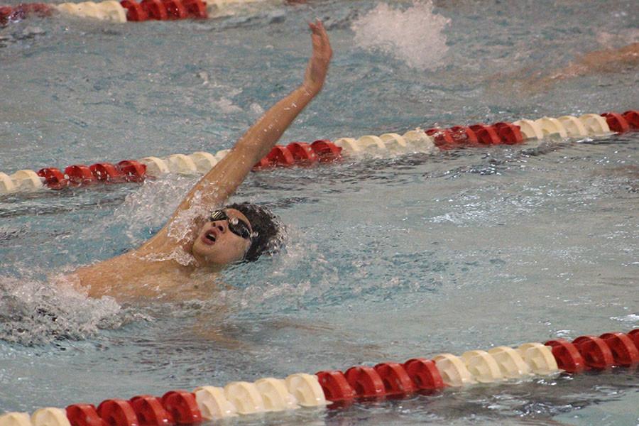 Sophomore Chris Hung swims the 200 individual medley.
Cinco Ranch won the district title in first place with 106 points.  The runner-up team achieved only 99 points.