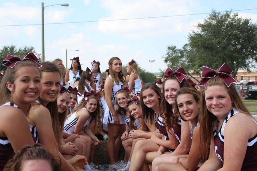 The Varsity and Junior Varsity cheer squads presented themselves near the front of the parade with loud music and ready smiles.
