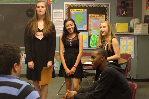 Singing love: choir students visit classrooms around the school