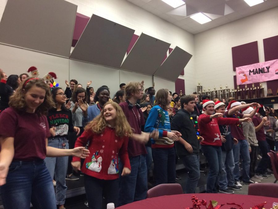 Choir students shared sounds of the season Wednesday throughout the school day as they treated faculty to the inaugural Carols & Cookies in the choir room. The event provided a break for staff during teacher conference periods to enjoy holiday treats and festive seasonal music.